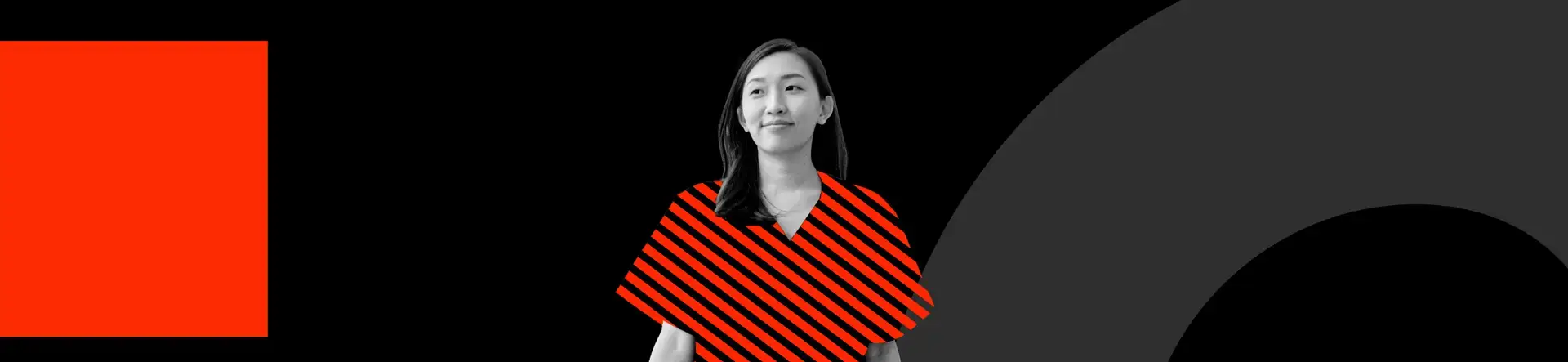 A woman stands confidently against a black background with modern geometric shapes, including a solid red square and a large dark gray arc—evoking the bold creativity of healthcare marketing and brand strategy. Red diagonal stripes overlay her clothing, adding a graphic design element.